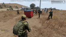 a screenshot of a video game shows a red container being pulled out of the ground