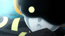 a cartoon character with a yellow circle on his face