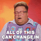 a man with glasses and a purple sweater says all of this can change in