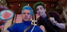 a man with blue hair is standing next to another man with green hair .
