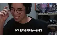 a man wearing glasses and headphones is smiling in a room
