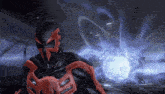 a man in a black and red spiderman suit is standing in front of a blue light in a video game .