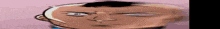 a close up of a cartoon character 's face with a serious expression .