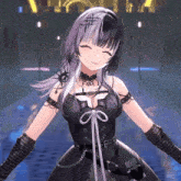 a girl in a black dress and gloves is smiling and looking at the camera