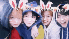 a group of young men wearing bunny ears are posing for a picture together .