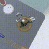 a dog is playing with a large ball on the ground