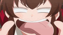 a close up of a person 's face with their tongue sticking out