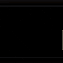 a computer screen shows a dark background with a glowing circle in the middle