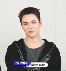 a young man with a speech bubble that says vernon on it