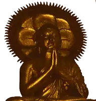 a golden statue of a buddha with a flower in his head