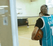 a basketball player wearing a number 7 jersey