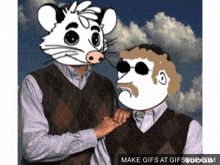 a man wearing a mouse mask holds another man 's arm