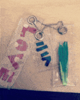 a plastic bag with the word rita on it next to a green vegetable