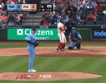 a baseball game between the phillies and the tor is being played