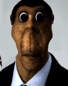 a close up of a man 's face with a monkey 's nose .