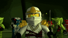 a group of lego ninjago characters including a white ninja