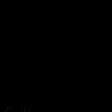 a close up of a man 's face with a black background and a gray collar
