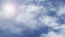the sun shines through the clouds in the blue sky