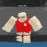a roblox character with a red shirt and white arms is standing on a blue surface .