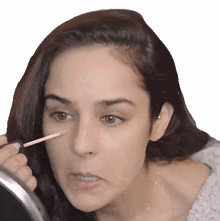 applying concealer angira dhar pinkvilla putting on make up getting ready