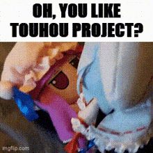 a stuffed animal with the words `` oh , you like touhou project ? '' written on it .