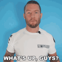 a man wearing a shirt that says limitless on it