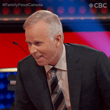 staring gerry dee family feud canada intent look paying attention