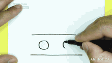 a person is drawing two circles with a marker on a piece of paper that says draw cute things on the bottom