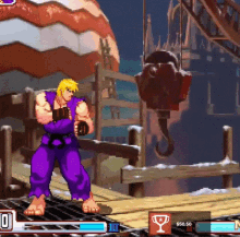 a man in purple pants is playing a video game with a trophy on the bottom right