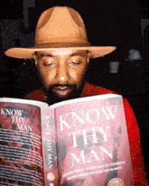 a man is reading a book titled know thy man