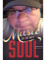 a man wearing glasses and a hat with the words " music is in my soul "