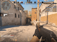 a person holding a gun in a video game with the time 7:50