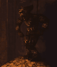 a dark room with a few spots of light on a wall