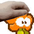 a pixel art of a hand holding a cartoon character 's face .
