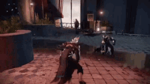 a person is playing a video game with a sword and a shield .