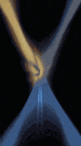 a computer generated image of a tunnel with a few lines of light coming out of it