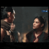a man and a woman are looking at each other with the words ano 't sila 'y natatalagan