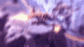 a blurry picture of a purple background with a yellow light in the middle