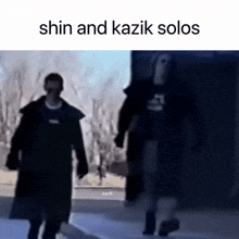 a couple of people walking down a street with the words shin and kazik solos on the bottom .