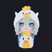 a stuffed animal with a chicken hood on it