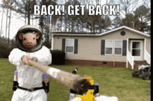 a picture of a pig wearing a space suit with the words back get back