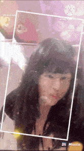 a woman 's face is displayed in a frame with the words mivita app on the bottom
