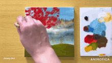 a person is painting on a canvas with the words made in animatica on the bottom right