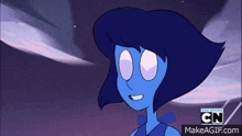 lapis lazuli from steven universe is smiling and looking at the camera .