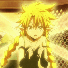 a close up of a girl with yellow hair and ears