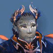 a close up of a person 's face with a blue background