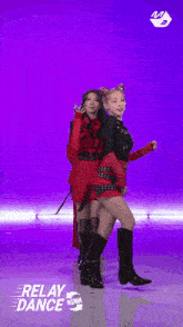 three women in red outfits are dancing with the words relay dance below them