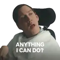 a man in a wheelchair has the words anything i can do written on his face