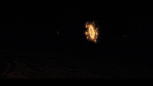 a large explosion with a lot of sparks coming out of it