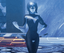 a woman in a black and white costume is standing in a dark room